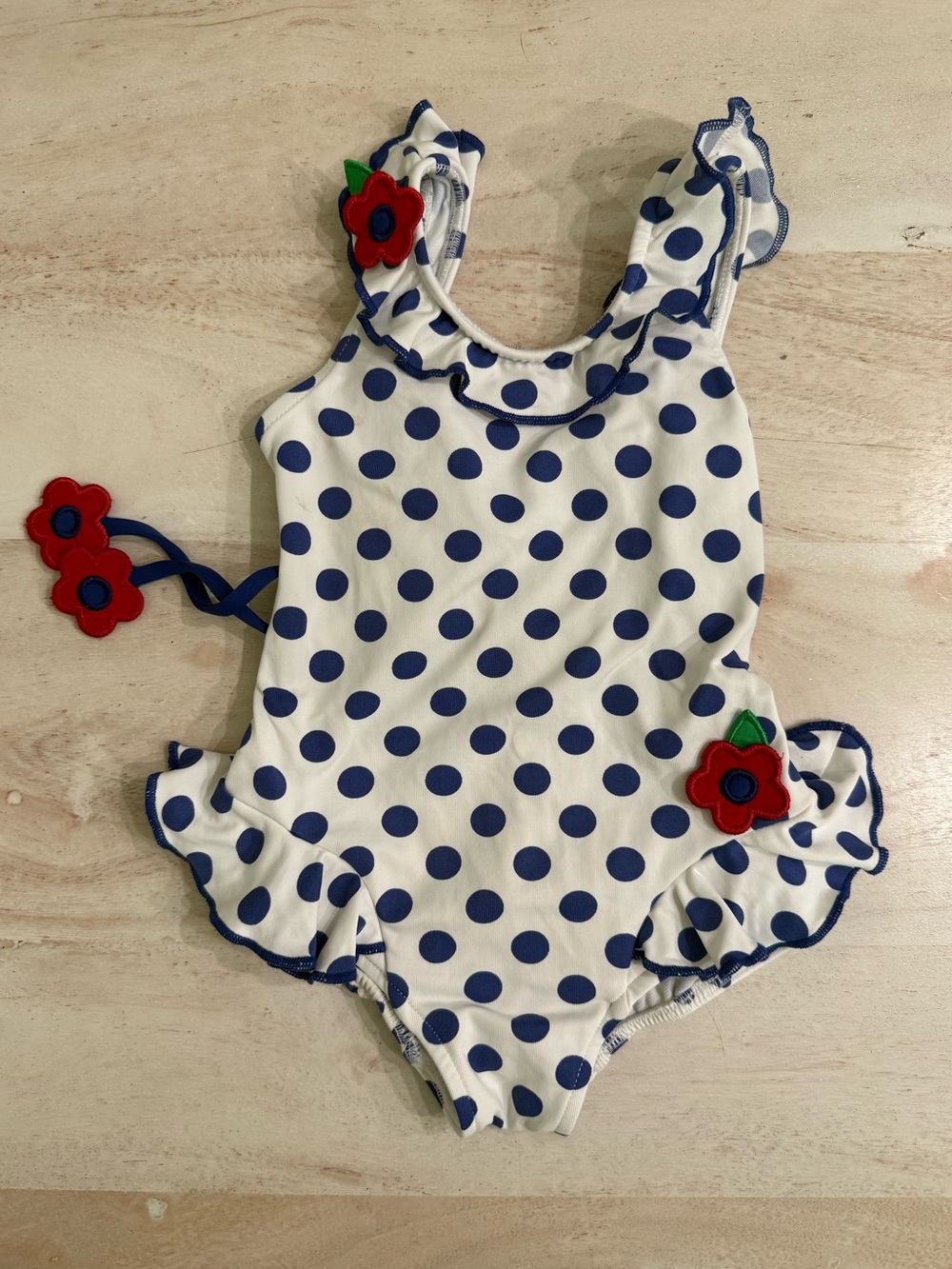 Florence Eiseman 2T swimsuit
Girls Polka Dot Ruffle with Red Flower Accent